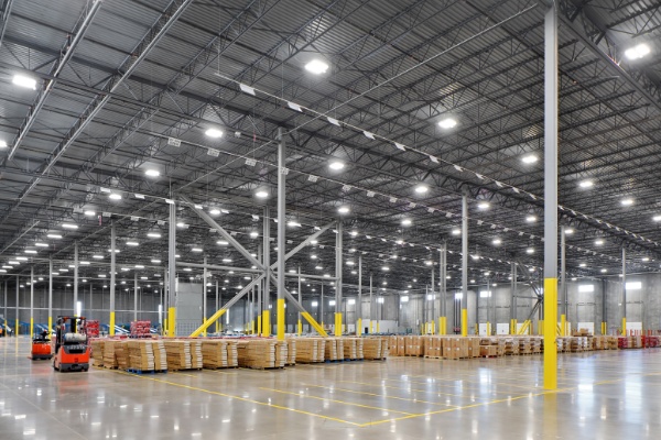 Warehouse with pallets on the floor.